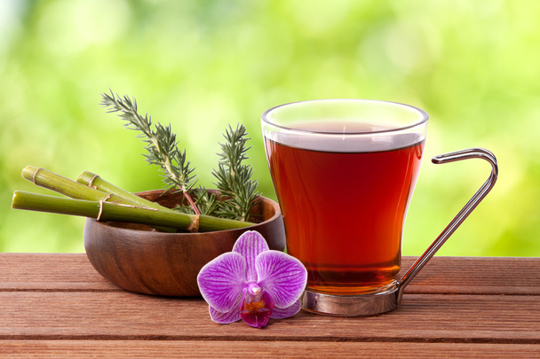 Copa de té, bebidas calientes a base de hierbas
 - Foto, Imagen