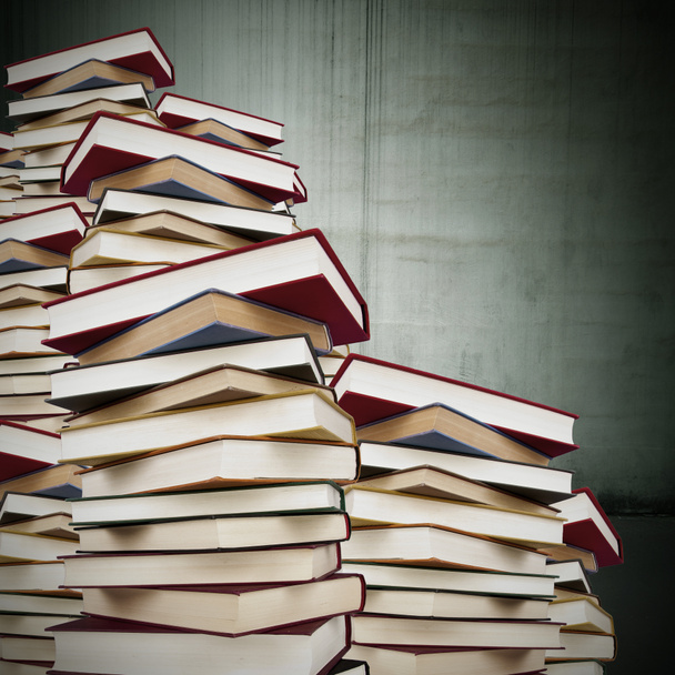 Stacked with books background - Photo, Image