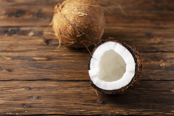 half of fresh coconut, exotic tropical fruit  - Фото, зображення