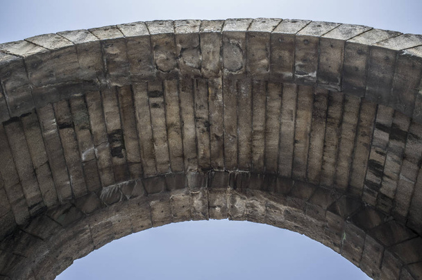 Intrados of Roman Arch of Trajan, monumental access gateway to ancient Emerita Augusta, Merida, Spain - Photo, Image