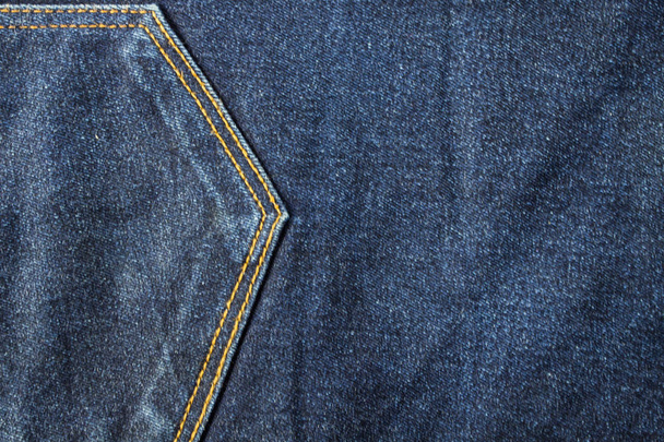 The textured background from rough cotton material, Jeans or denim of pale blue color - Photo, Image