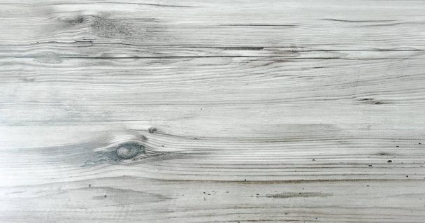 wood background texture, light weathered rustic oak. faded wooden varnished paint showing woodgrain texture. hardwood washed planks background pattern table top view. - Photo, Image