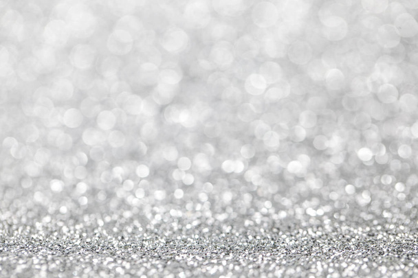 Abstract silver glitter light bokeh holiday party background - Foto, Bild