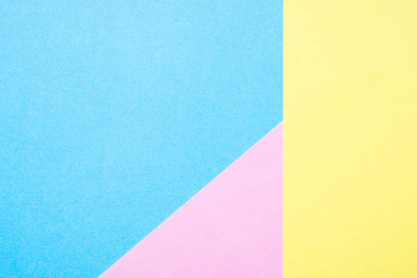 Blue, yellow and pink paper background.  - Photo, Image