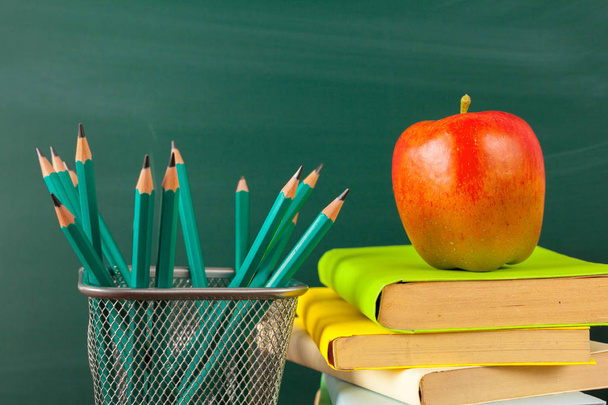 back to school - apple and books with pencils and blackboard - Φωτογραφία, εικόνα