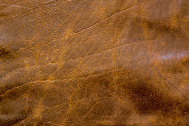 Fondo abstracto de textura de cuero marrón viejo con rayado. Color retro o vintage
. - Foto, imagen