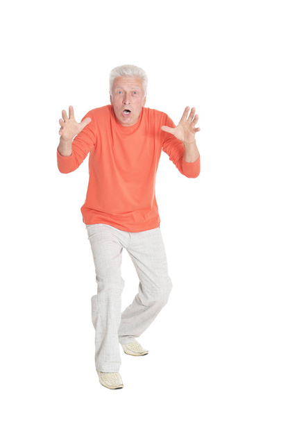 portrait of  surprised  senior man isolated on white background - Foto, afbeelding
