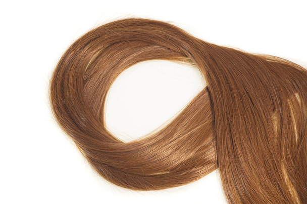 Λαμπερά καστανά μαλλιά με απομονωμένο χώρο για το κείμενο - Φωτογραφία, εικόνα