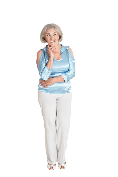 smiling senior woman posing isolated on white background - Фото, изображение
