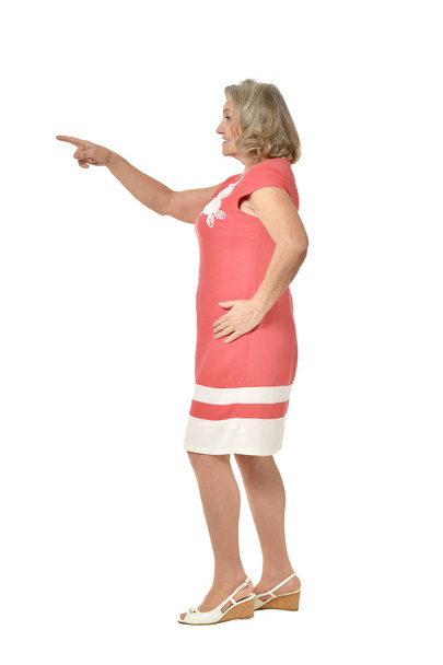 senior woman showing something  isolated on white background - Photo, Image