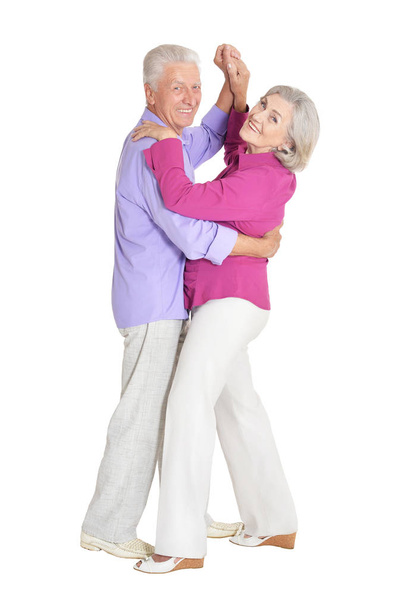portrait of happy senior couple dancing  isolated on white background - Photo, image