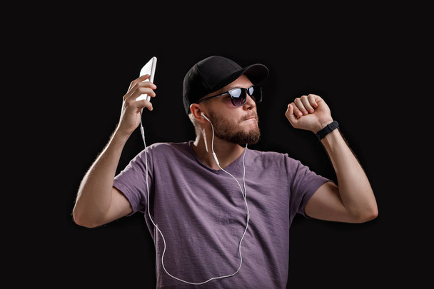 man listening to music in headphones - 写真・画像