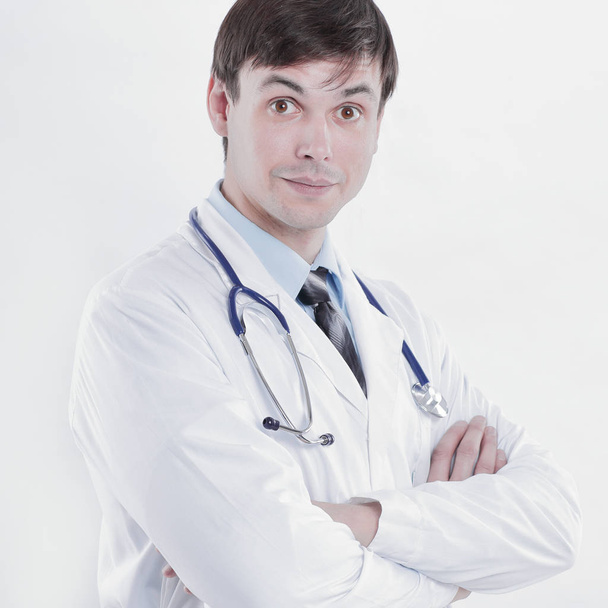 Portrait of a young doctor. Doctor in white coat - Foto, immagini