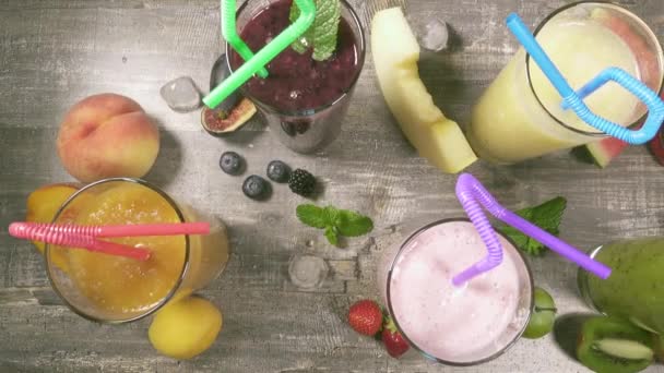 Fresh fruit juices and the movement of the camera along top view - Footage, Video