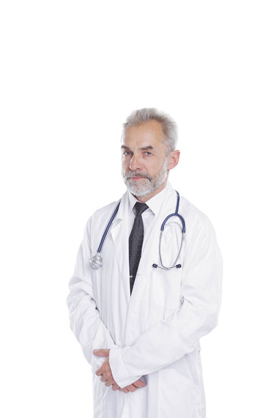 portrait of a senior physician therapist.isolated on light background - Foto, imagen