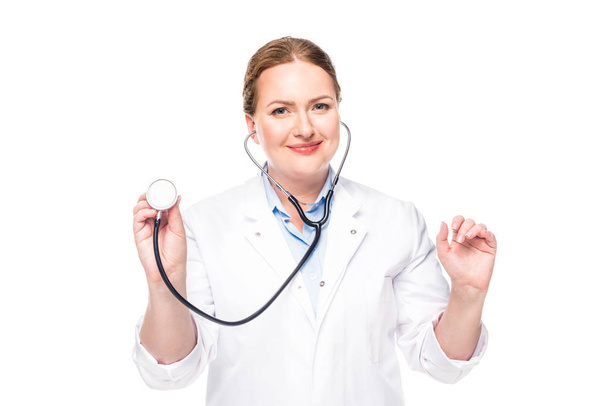 attractive female doctor in white coat with stethoscope isolated on white background  - Fotoğraf, Görsel