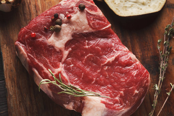 Raw beef filet mignon steak on wooden board - Photo, Image