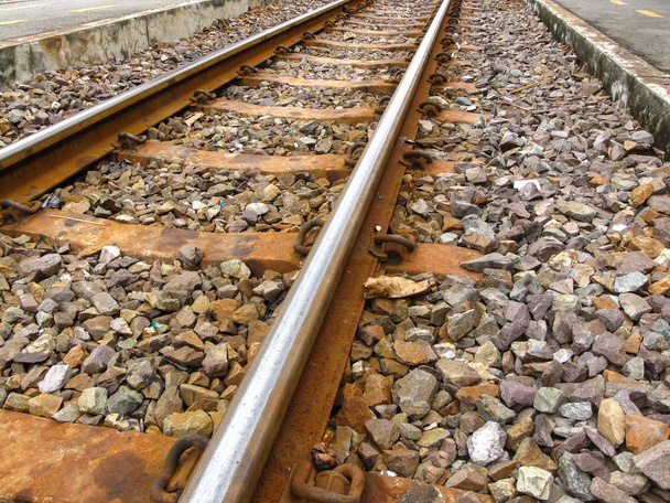 Railroad tracks at train station - Fotó, kép