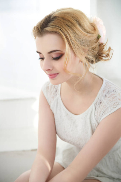 Beauty portraits of a cute blonde bride. - Фото, изображение