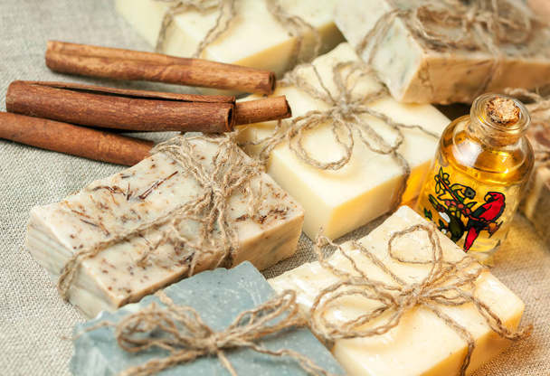 Pieces of organic handmade soap on linen cloth - Photo, Image