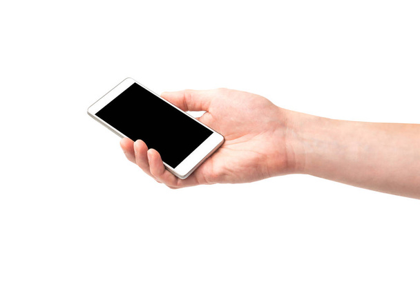 Rękę trzymając smartfon z czarny ekran na białym tle - Zdjęcie, obraz