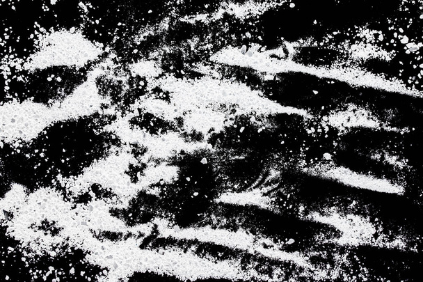 white powder on a black background - Foto, Imagen