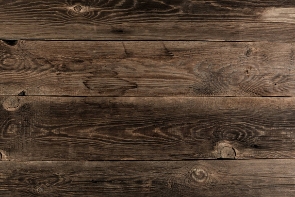 Fond en bois. Texture avec des planches anciennes, rustiques et brunes - Photo, image