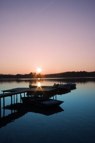 naplemente a tónál - Fotó, kép