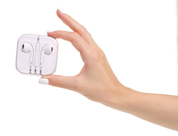 White headphones in hand - Fotografie, Obrázek