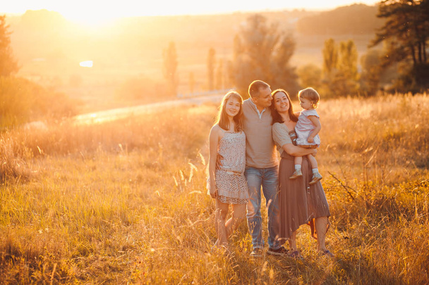 family in a field - Photo, Image