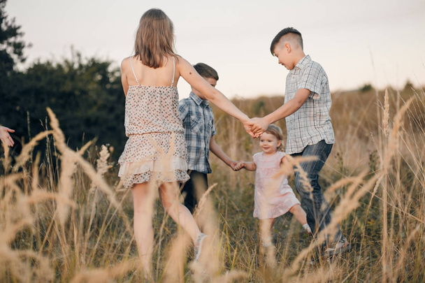 kids in a field - Photo, image