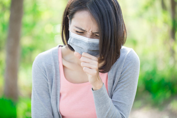 woman got sick and coughing  in the forest - Photo, Image