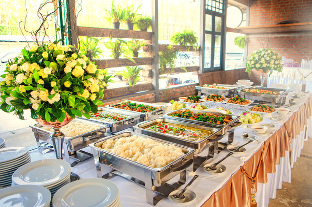 Thai buffet dinner at the beautifully arranged wedding and sunshine. - Photo, Image