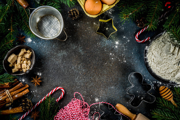 Різдвяний випічка фон з інгредієнтами для приготування різдвяної випічки, темно-синій фон, вид зверху
 - Фото, зображення