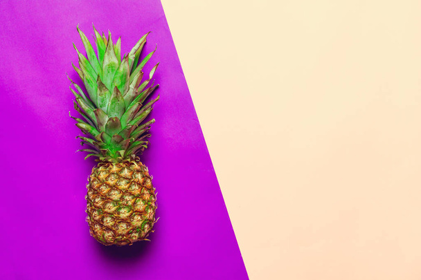pineapple on colored paper - Foto, Imagen