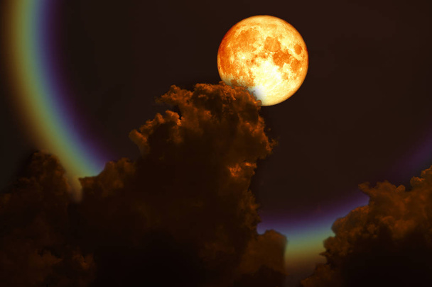 full blood moon back over silhouette dark red cloud, Elements of this image furnished by NASA - Photo, Image