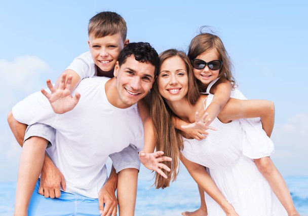 Happy family on vacation on tropical beach  - Foto, Imagem