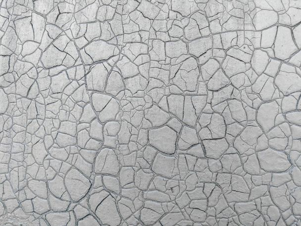 Old cracked paint on the wall. Grunge texture - Photo, Image