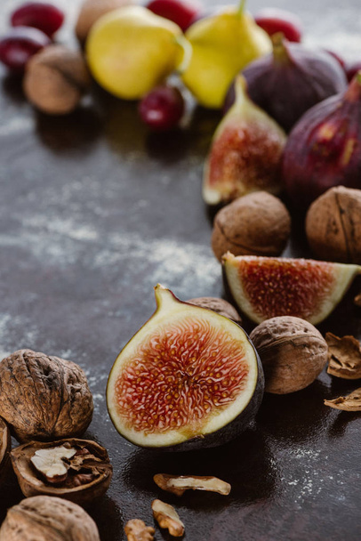 close up view of figs and hazelnuts arranged on tabletop - 写真・画像