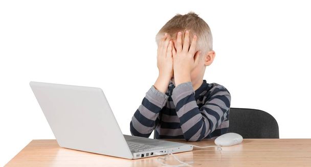 Young boy frustrated with computer - Fotó, kép