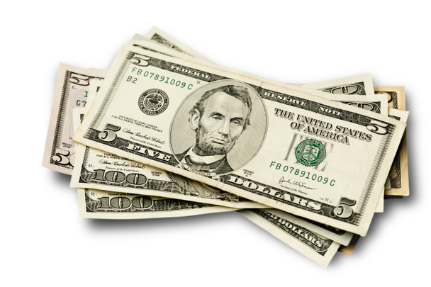 Montón de billetes en dólares aislados sobre fondo blanco
  - Foto, imagen
