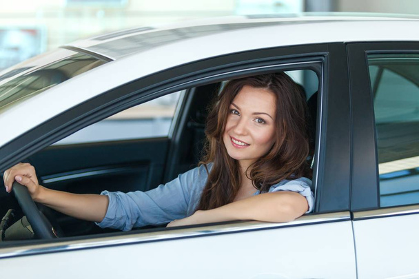 Young happy woman in car  - Фото, зображення