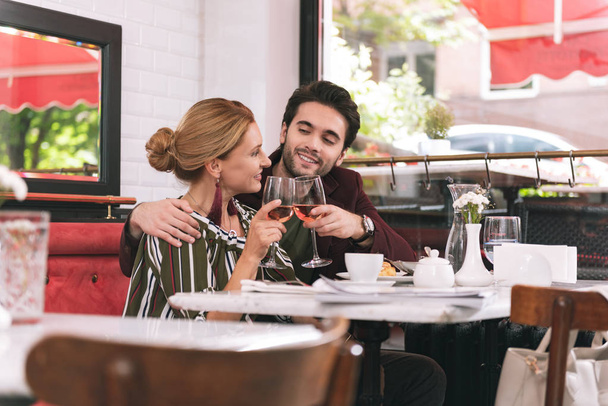 Sweet pleased couple assigning date - Photo, Image