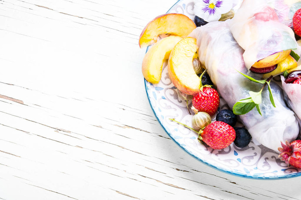 Fresh assorted Japanese summer rolls set with fruits.Vegan food - Photo, Image