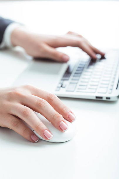 Hands typing on keyboard on modern laptop  - Foto, immagini