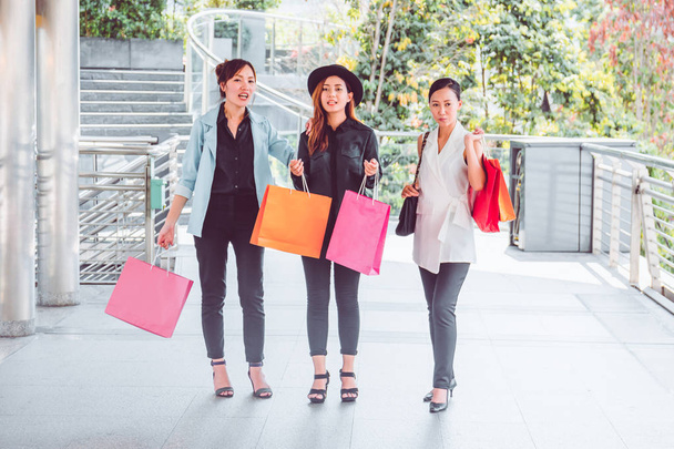 Happy woman with shopping bags enjoying in shopping. women shopping, lifestyle concept - 写真・画像