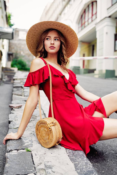 stylish female fashion model posing on the street  - Valokuva, kuva