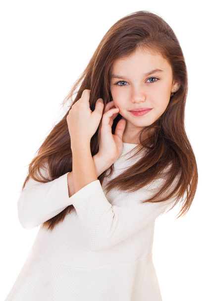 Beauty Model, Portrait of a charming brunette little girl, isolated on white background - Photo, Image