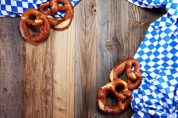 German pretzels with salt close-up on the table. - Photo, Image