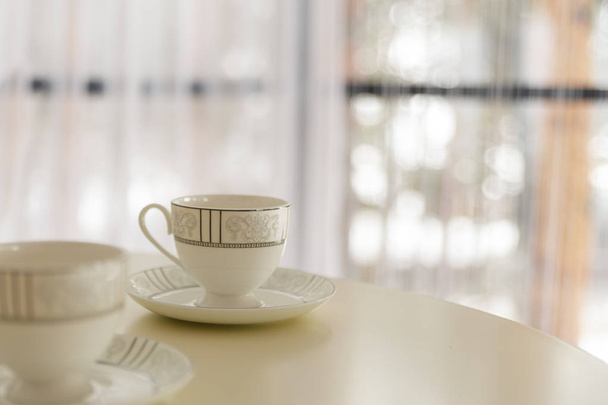 Two cups for tea on the table. Bokeh and blurred background. Selective focus. Copy space. - Foto, imagen